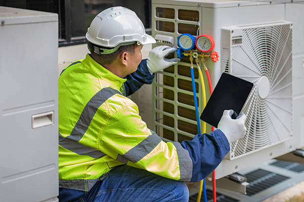 Professional Air Duct Cleaning technician working in Hampton Falls, NH